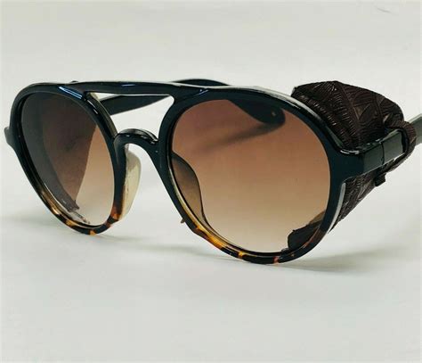 round sunglasses with leather side shields|More.